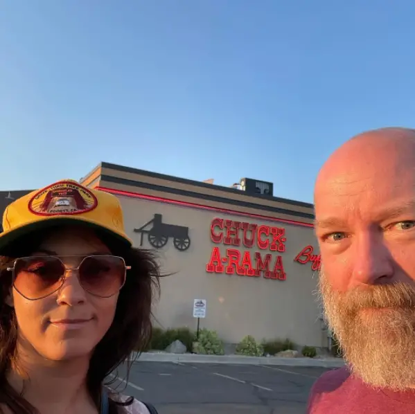 Kyle Kinane and the love of his life Rachel Olson in front of Chuk-A-Rama
