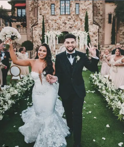 LeJuan James and his wife on the day of their wedding