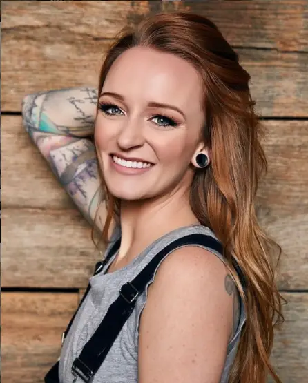 Maci Bookout posing for her clothing brand TTMLifestyle