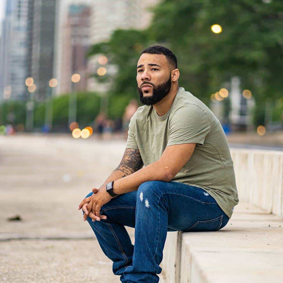 Marcus Rogers posing on a sidewalk 