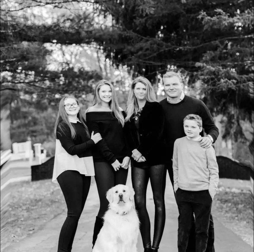 Scott Zolak along with his wife, Amy, and his children