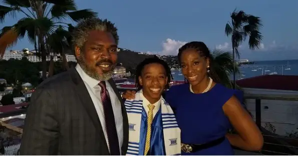 Stacy with her husband and son on the day of his graduation
